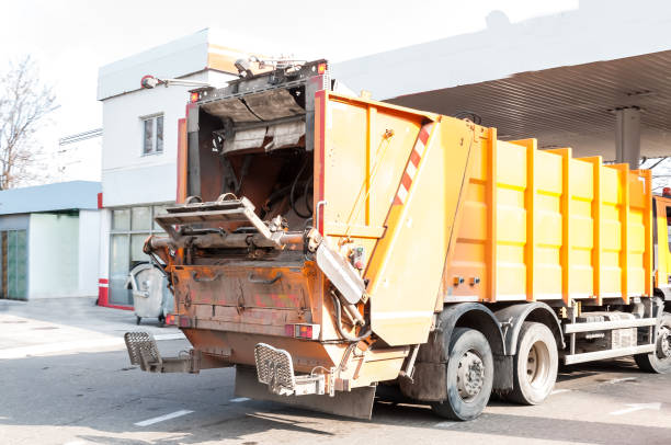 Yellow dumpster truck in Norwalk, CT.
